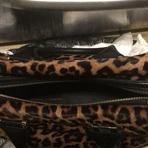 Faux leopard skin Michael Kors satchel.  Appears uncarried.